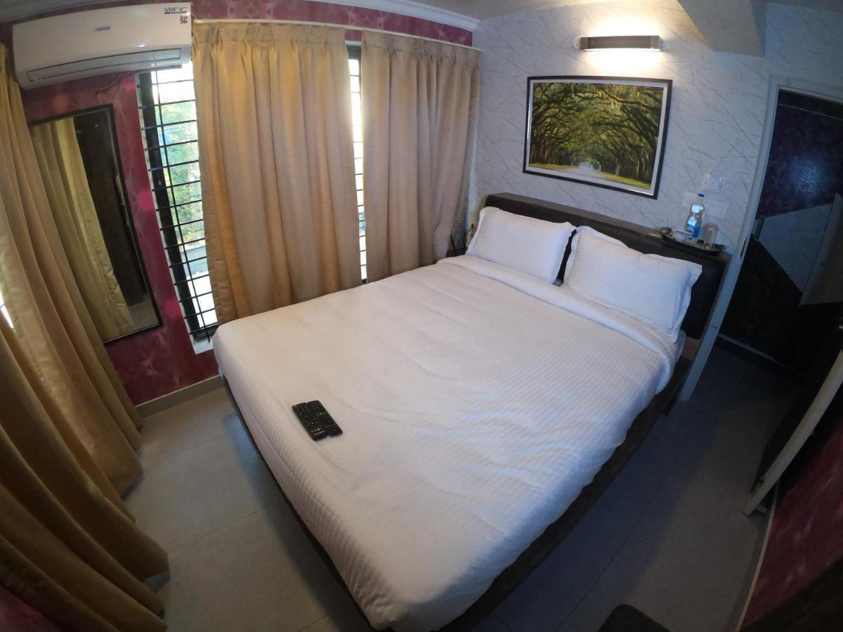 Fabhotel Seasons Suites - Jp Nagar Бенґалуру Номер фото